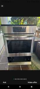 Frigidaire gas wall oven that start heating up